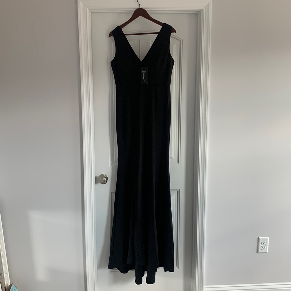 New formal black floor length gown with mesh detail. Size XL.